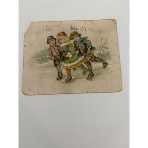 Vintage christmas trading card for Lion Coffee featuring 3 children skating
